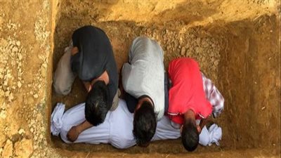 هل يجوز أن أوصي ب.دفن المصحف معي في كفن.ي؛